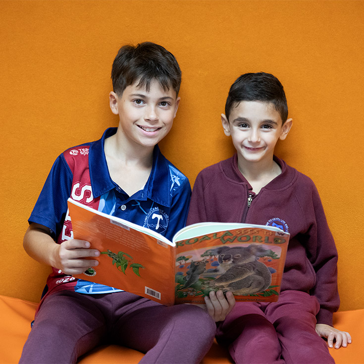 Students reading together in the library at St Bernadette's Primary School Dundas Valley